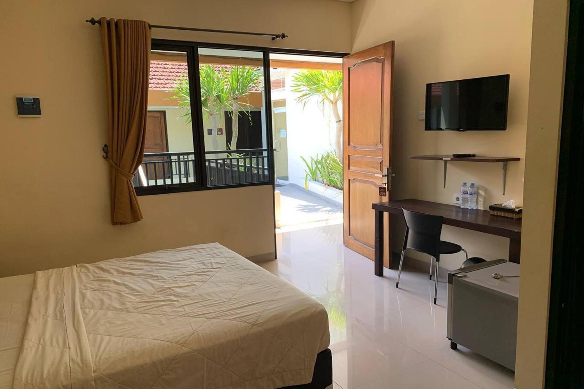 Hotel Dee Mansion à Denpasar Extérieur photo